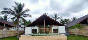 Zahrada ubytování The Club Villas Lombok