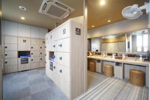 Kuchyň nebo kuchyňský kout v ubytování Dormy Inn Miyazaki Natural Hot Spring