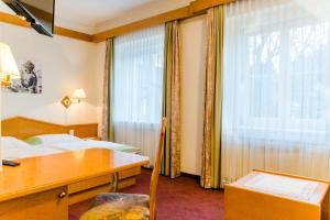 Voodi või voodid majutusasutuse Hotel Pendl toas