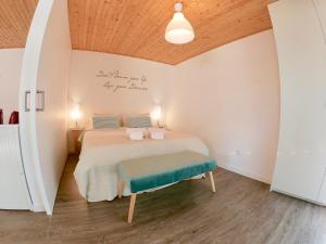 Cama ou camas em um quarto em Golden Halcyon - Ericeira Villas
