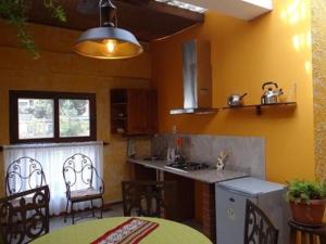 Küche/Küchenzeile in der Unterkunft Hostal Bivouac