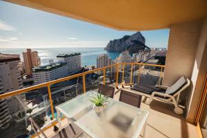 a balcony with a view of the ocean at En la playa. Planta 19. Vistas espectaculares. 2 terrazas. in Calpe