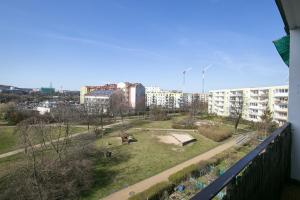 a view of a park in a city with buildings at Rooms4Less in Gdańsk