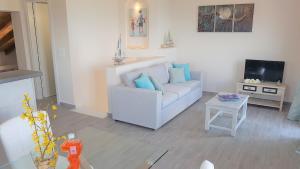 A television and/or entertainment centre at Sea View Private Pool Villa
