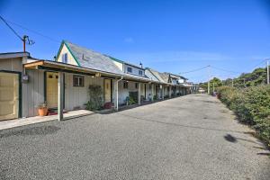 a row of houses on the side of a street at Sanderling Sea Cottages, Unit 2 Walk to Coast! in Waldport