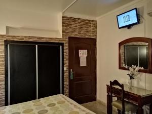 โทรทัศน์และ/หรือระบบความบันเทิงของ Hostel Boutique Marisol