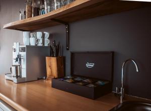 Kuchyň nebo kuchyňský kout v ubytování B&B Bleiswijk