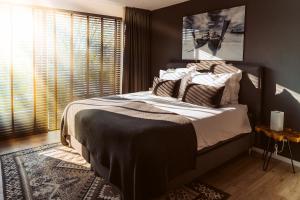 Postel nebo postele na pokoji v ubytování B&B Bleiswijk