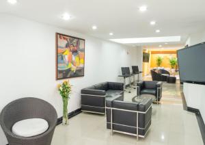 Area soggiorno di Hotel Regency Suites La Feria