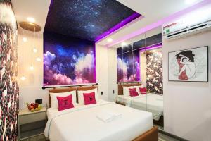 Postel nebo postele na pokoji v ubytování EROS Hotel - Love Hotel