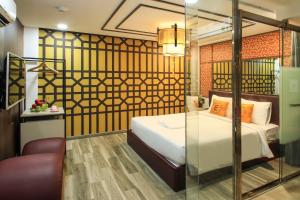 Postel nebo postele na pokoji v ubytování EROS Hotel - Love Hotel