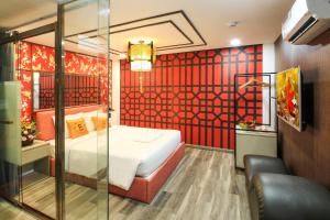 Postel nebo postele na pokoji v ubytování EROS Hotel - Love Hotel