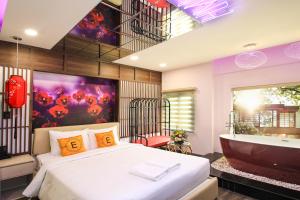 Postel nebo postele na pokoji v ubytování EROS Hotel - Love Hotel