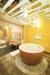 Postel nebo postele na pokoji v ubytování EROS Hotel - Love Hotel