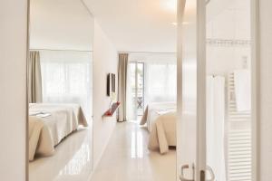 Voodi või voodid majutusasutuse Hotel SiX toas