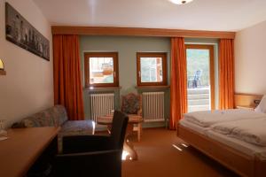 Postel nebo postele na pokoji v ubytování Hotel Gasthof Hereth
