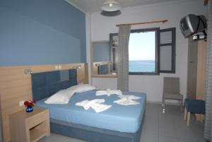 Кровать или кровати в номере Irene ROOMS & STUDIOS PETRA