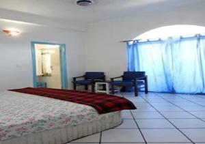 Letto o letti in una camera di Ray of Maya