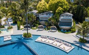 an aerial view of a resort with a pool at Melia Koh Samui in Choeng Mon Beach