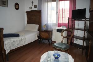 A seating area at B&B Maddalena Di San Zeno