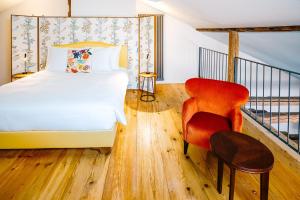 Łóżko lub łóżka w pokoju w obiekcie Luxury Residences by Widder Hotel