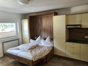 Łóżko lub łóżka w pokoju w obiekcie Apart Felsenhof