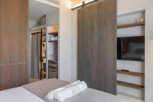 Cama ou camas em um quarto em Branco Mykonos