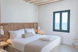 Cama ou camas em um quarto em Branco Mykonos