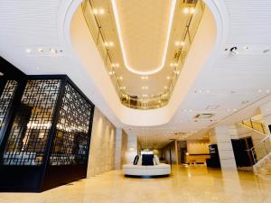 ART Hotel Oita的电视和/或娱乐中心