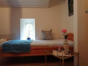 Ein Bett oder Betten in einem Zimmer der Unterkunft Gaststatte Waldheim