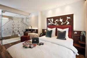 Voodi või voodid majutusasutuse Hotel Scheuble toas
