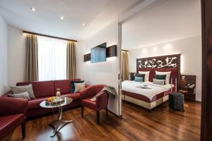 Voodi või voodid majutusasutuse Hotel Scheuble toas