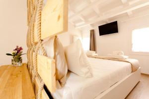Katil atau katil-katil dalam bilik di Colibrì house