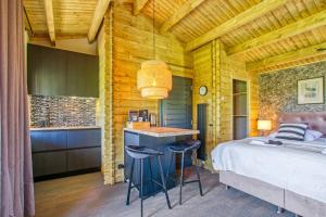 Postel nebo postele na pokoji v ubytování Appel Lodge