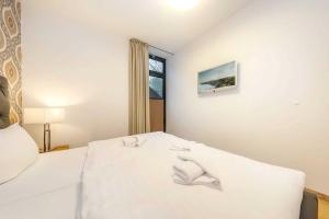 Ein Bett oder Betten in einem Zimmer der Unterkunft die Strandvilla Nordlicht