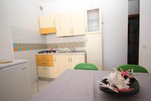 Kuchyň nebo kuchyňský kout v ubytování Residence Sole e Mare appartamenti
