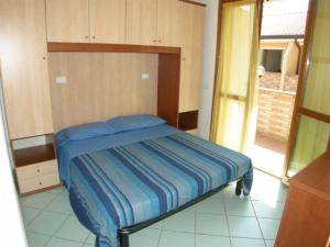 Postel nebo postele na pokoji v ubytování Residence Sole e Mare appartamenti