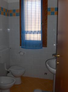 Koupelna v ubytování Residence Sole e Mare appartamenti