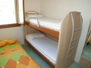 Postel nebo postele na pokoji v ubytování Residence Sole e Mare appartamenti