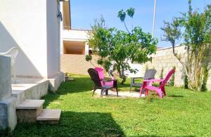 Vonkajšia záhrada v ubytovaní Villa Rosso Corallo