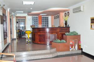 a lobby with a counter in a building at An An Hotel in Rạch Giá