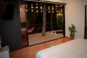 Letto o letti in una camera di Mumu by Bernalo Hotels