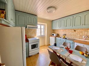 Kuchyňa alebo kuchynka v ubytovaní San Rocco Sqr. Apartment