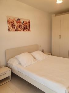 Postel nebo postele na pokoji v ubytování Ocean View Apartament