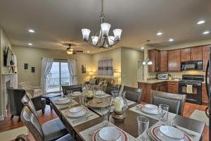 a dining room and kitchen with a table and chairs at Canandaigua Lake House with Lake View and Fire Pit! in Rushville