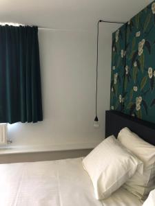 Postel nebo postele na pokoji v ubytování B&B Maison Ruthier