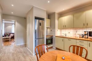 Kuchyň nebo kuchyňský kout v ubytování Trondheim Leilighetshotel + 28 fotografií