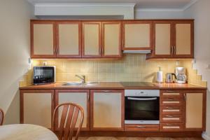 Kuchyň nebo kuchyňský kout v ubytování Trondheim Leilighetshotel