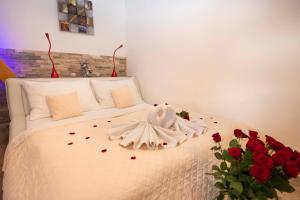 Ένα ή περισσότερα κρεβάτια σε δωμάτιο στο Romantický wellness suite hotel Heinz
