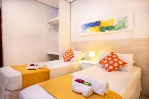 Krevet ili kreveti u jedinici u okviru objekta Brazilodge All Suites Hostel